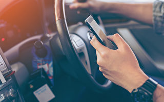 新州開車使用手機者9月起扣5分