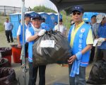 关怀海洋中油洁净地球   董事长戴谦带头净滩