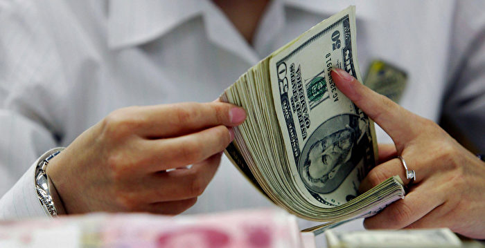 离岸人民币兑美元汇率失守7.1 创半年新低