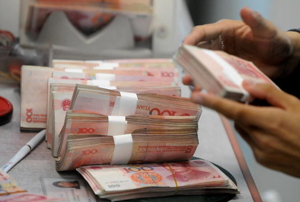 中共官员承认经济面临人民币升值等风险
