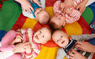 Overhead View Of Babies Having Fun At Nursery Playgroup