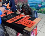 金猪贺岁赠春联 名师挥毫春帖报喜