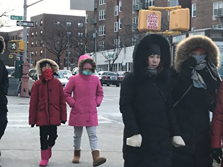 昨天是1985年以來最冷的1月21日，街上的行人全副武裝禦寒，把自己裹得嚴嚴實實。