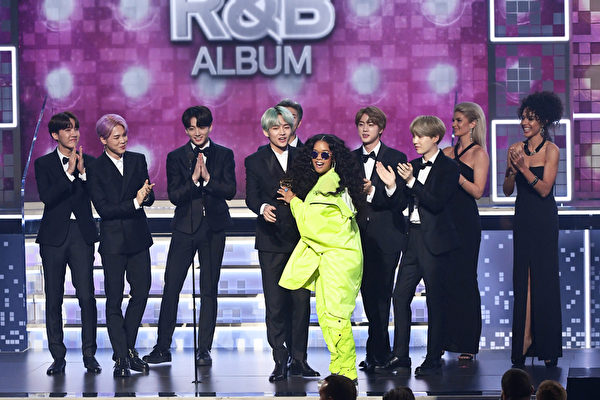 BTS speak onstage during the 61st Annual GRAMMY Awards