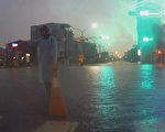 风雨中的无名英雄 只身指挥交通一整夜