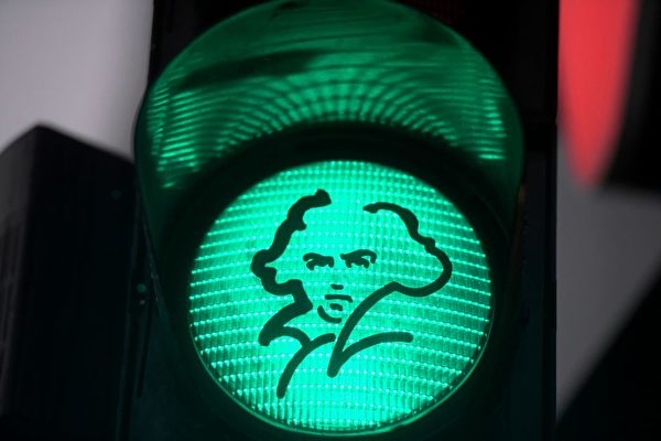 A green traffic light with the portrait of German composer Ludwig van Beethoven is pictured in his native city of Bonn, western Germany, on December 13, 2019. - Germany is starting into the "Beethoven-Year" with more than 700 events to celebrate the 250th anniversary of Ludwig van Beethoven's birth. (Photo by INA FASSBENDER / AFP) (Photo by INA FASSBENDER/AFP via Getty Images)