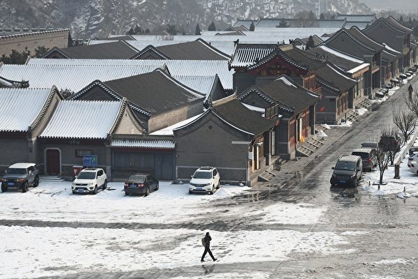 1月6日，北京降雪情况。（GREG BAKER/AFP via Getty Images）