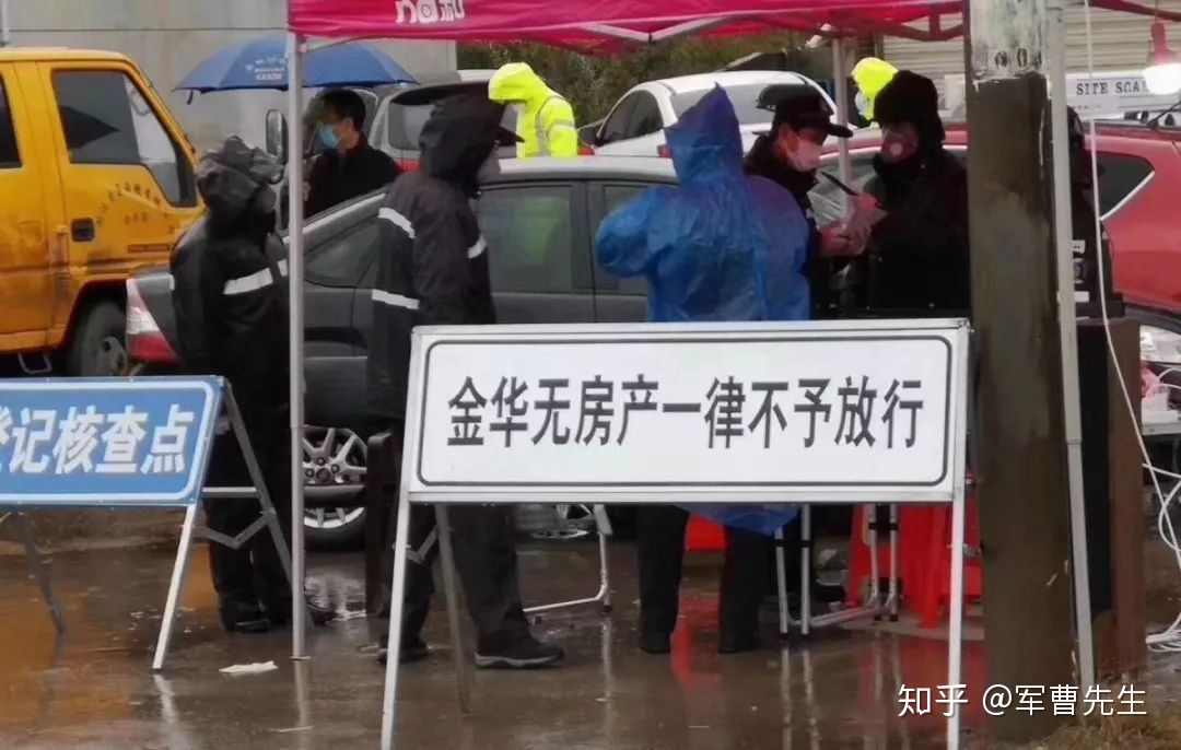 At a traffic check point in Jinhua City, Zhejiang Province, the white sign reads, "Those who don't own a property in Jinhua are absolutely forbidden to enter."