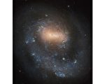 NGC 4618：只有一个旋臂的螺旋星系