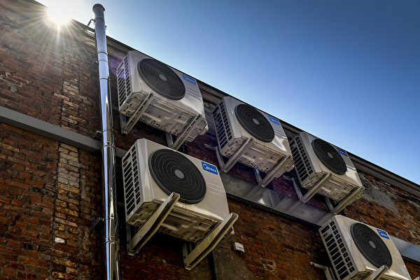 電氣因素是引起火災的最大原因，其中冷氣和電風扇是高溫天氣中常見的起火源。 (DIRK WAEM/AFP via Getty Images)