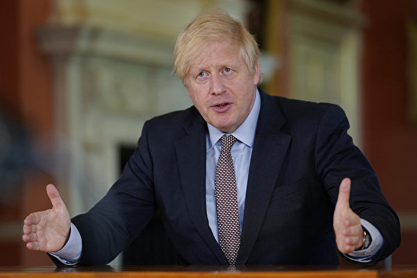 英國首相約翰遜宣布分階段重啟經濟