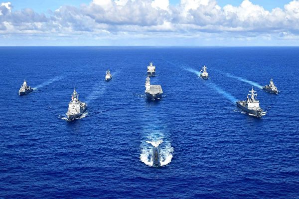 9月11日，澳洲、日本、南韓和美國海軍的艦艇編隊航行，在關島附近海域演習。（日本海上自衛隊官方圖片）
