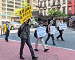 舉「支持法輪功」標語遊行   基督徒：法輪功為義受逼迫