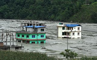 尼泊尔洪水25人失踪 11死含两中国工人