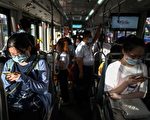 组图：上海发现确诊病例 民众戴口罩防范