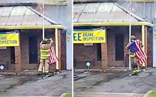 汽车商店起大火 美消防员及时救下一面国旗