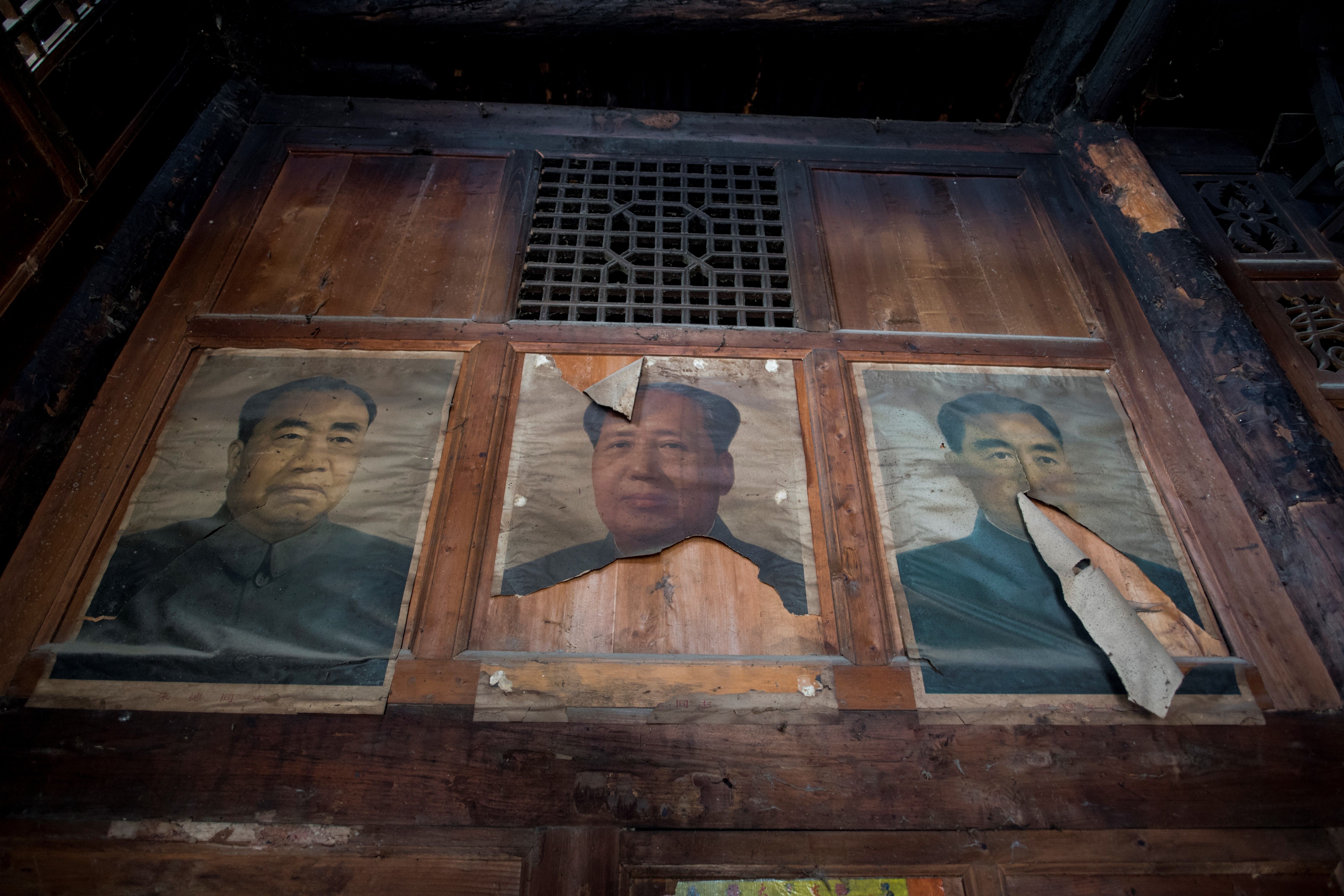 在中共内部，很多高层领导都不是无神论者，强迫中国人不要信神。但是毛泽东自己却深信神传文化。（Johannes Eisele/AFP via Getty Images）