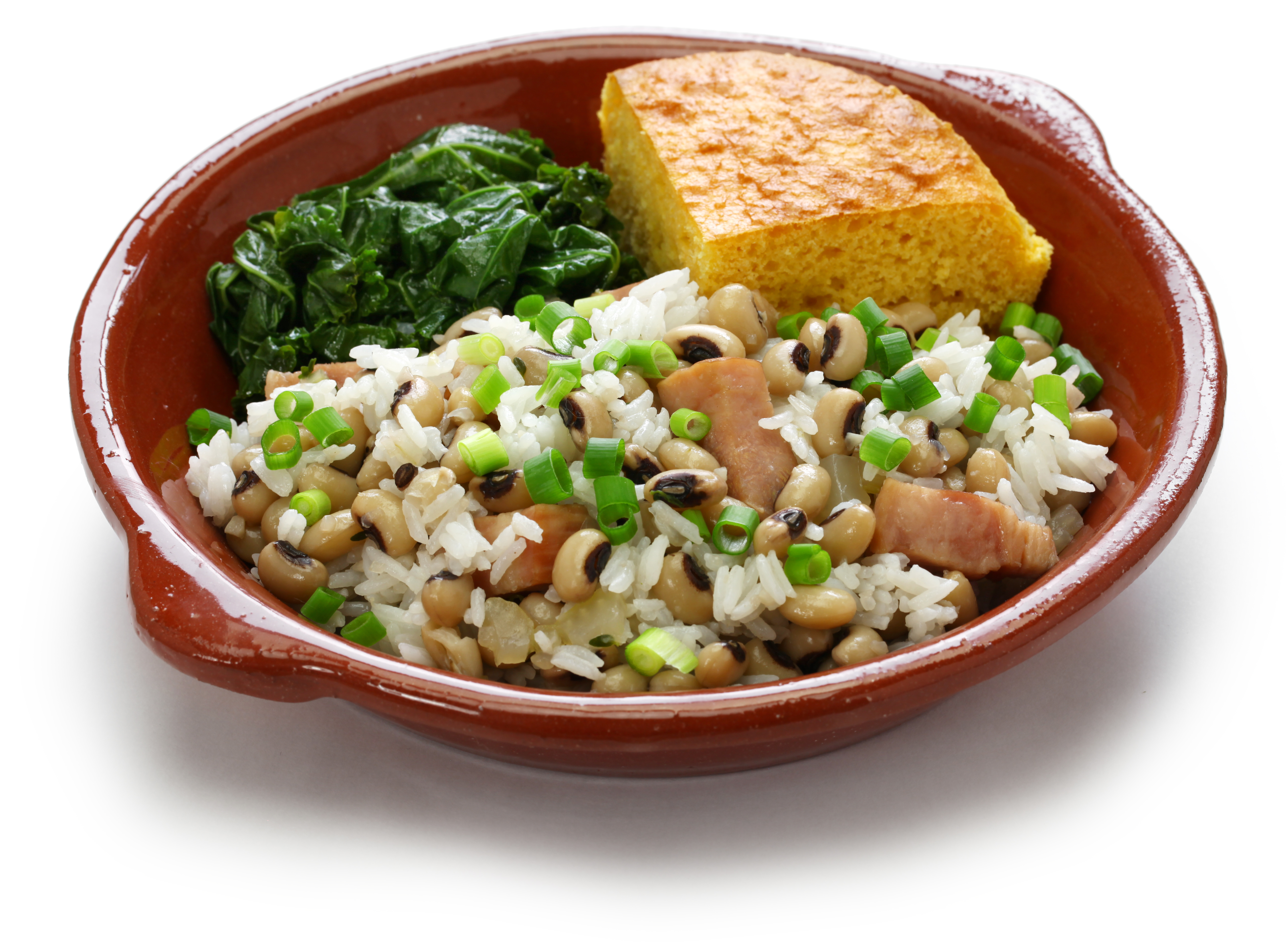 美国南方新年的传统食物：黑眼豆饭、玉米面包和羽衣甘蓝。(Shutterstock)