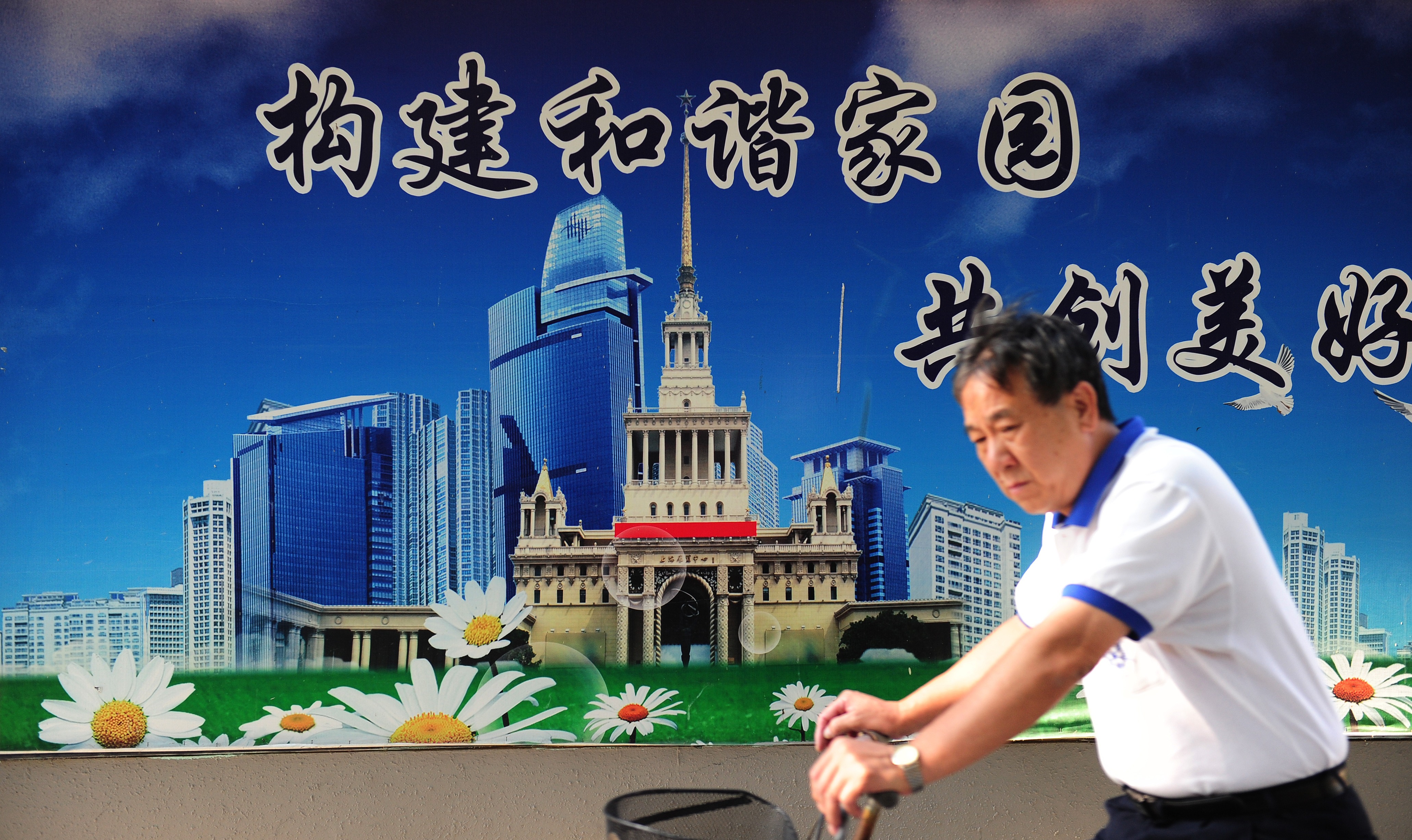 中国共产党祸国殃民，在中共“一党独裁”领导下，“共同富裕”是假的，共产党要的是“共产独财”。（Mark Ralston/AFP）