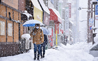 强烈寒流袭击日本 多地降雪创纪录