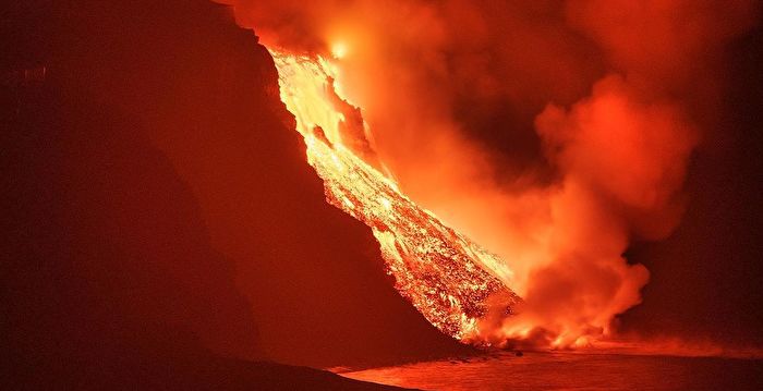 组图：摄影师记录西班牙火山喷发 历时三月