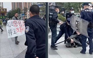 深圳一男子举横幅“打倒习近平”被警察带走