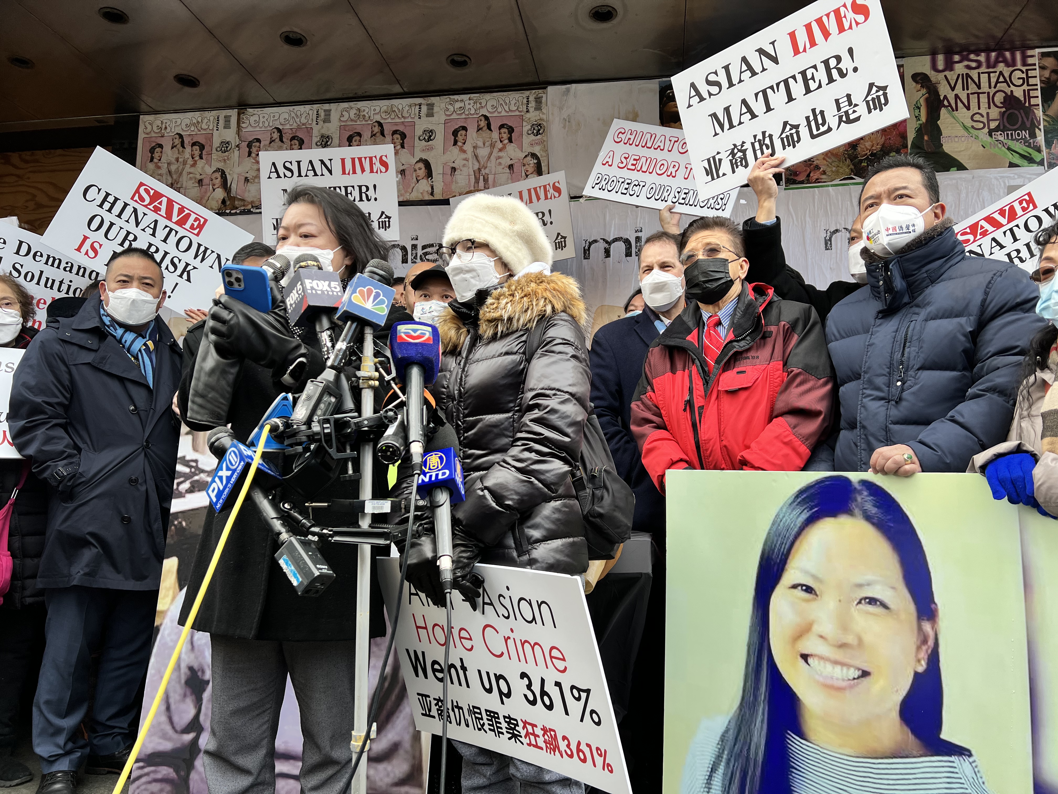 Hate crime victim Fan Sui Yam spoke at the rally mourning the death of Michelle Alyssa Go, who was pushed into NYC subway tracks by a mentally distressed homeless man. (Hannah Cai/The Epoch Times)