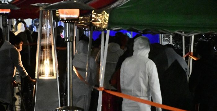 组图：香港南昌邨两大楼爆疫情 遭封区强检