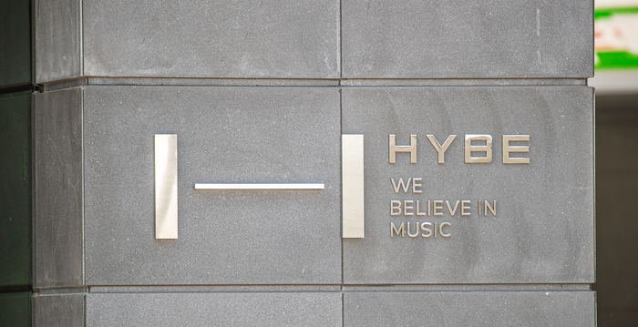 HYBE Announces Lawsuit Against ADOR’s Min Xizhen for Seizing Management Rights
