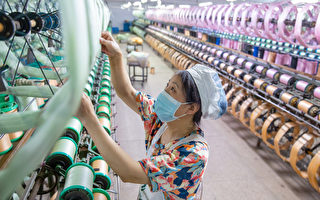 中国纺织企业近三成亏损 利润总额降二成