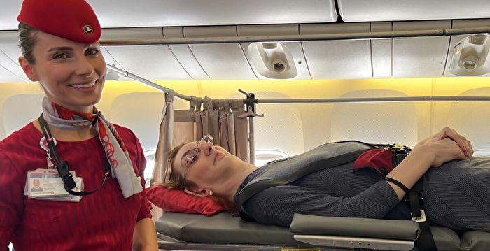 航空公司大改机位 助世界最高女子首次乘飞机