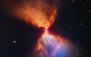 韦伯望远镜拍到恒星形成影像 犹如太空沙漏