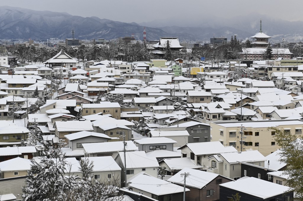 寒流襲日韓 擾亂交通 民眾冒雪出遊（多圖）