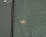 西九龍裁判法院疑遭氣槍射擊 玻璃外牆留有彈孔並出現裂痕