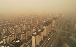 中国30余省市气温骤降 多省下冰雹刮沙尘