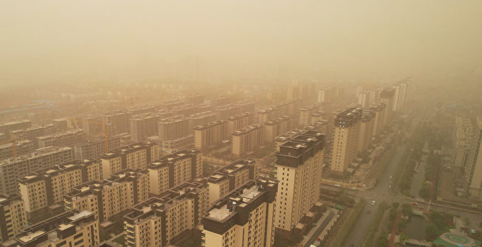 中国30余省市气温骤降 多省下冰雹刮沙尘