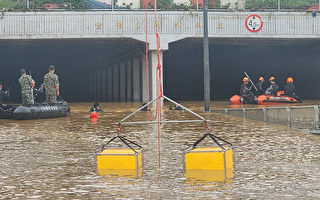 韩国暴雨引发山洪 隧道被淹没 捞出9具尸体