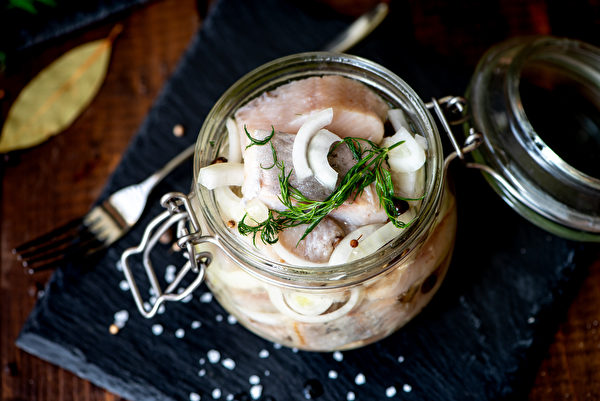 Pickled Herring Onions And Spices In A Jar On The