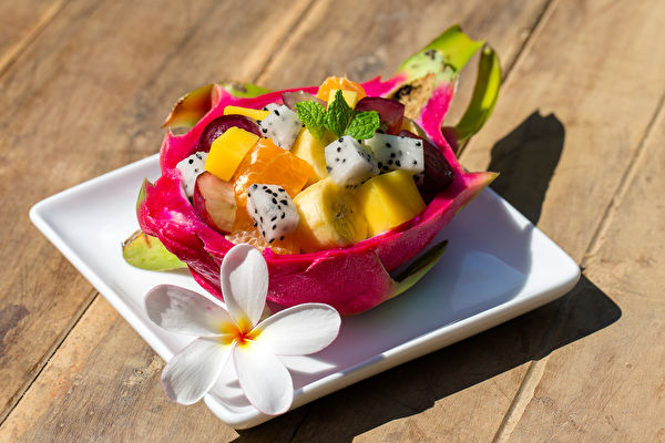 Fresh Tropical Fruit Salad In Dragon Fruit Skin - Healthy