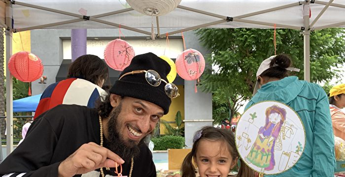 传统节日体验多元文化 西人也爱“真善忍”