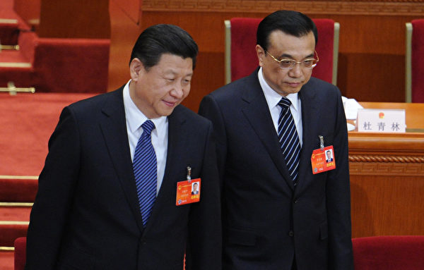 2014年，中共两会上的习近平与李克强。（WANG ZHAO/AFP via Getty Images）