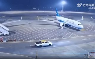 杭州机场一车辆失控撞向飞机 地勤人员狂奔阻拦