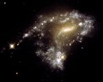 NASA新图：星系碰撞形成“一串珍珠”