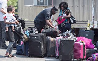 魁北克要求聯邦償還10億元難民安置費用