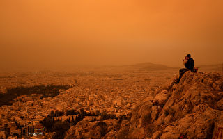 沙尘暴来击 希腊雅典天空变橘色如置身火星