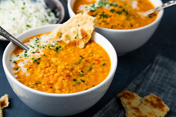 Red Lentil Soup With Coconut Milk And Curry Accompanied By