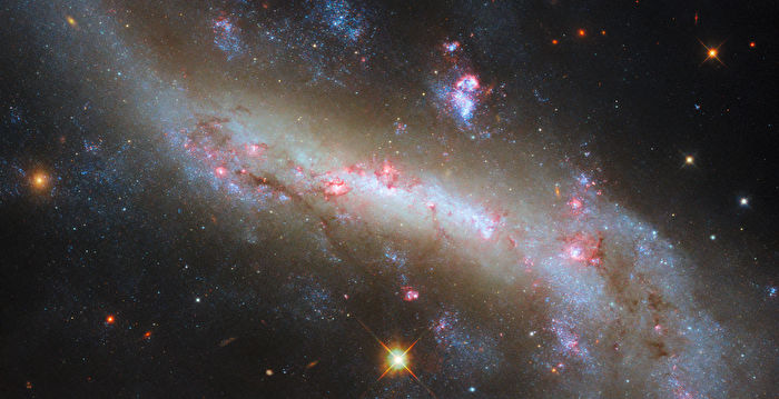 NASA has captured the brilliant streaks of the galaxy NGC 4731 |