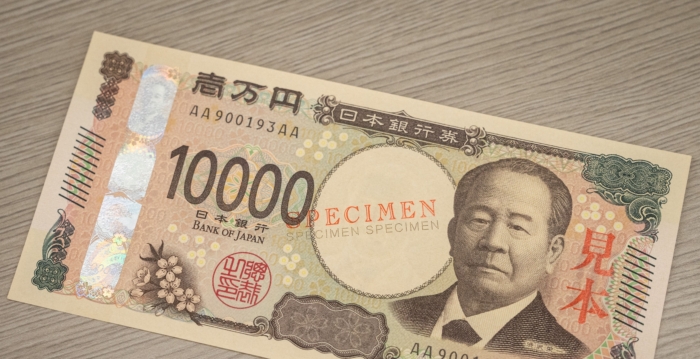 香港街头多人持刀抢走10亿日圆 一大陆男被抓