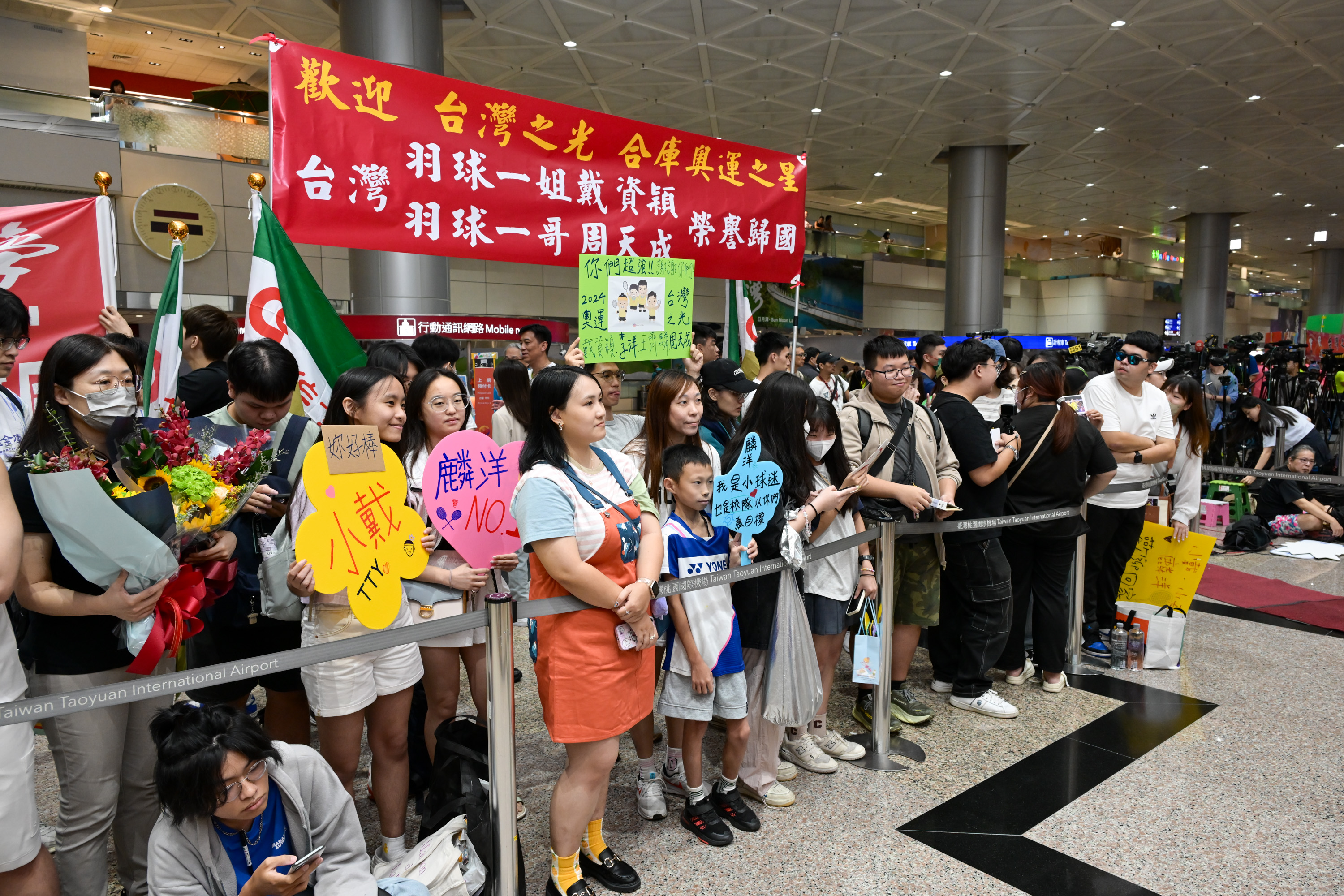 奧運選手們陸續回台,桃園機場也掀起了接機旋風。(宋碧龍/攝影)