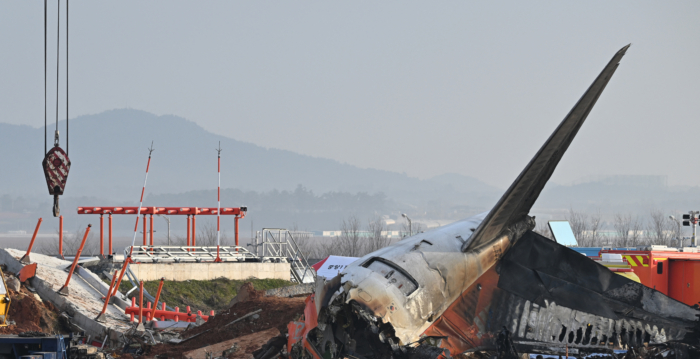 济州航空空难调查继续 务安机场关闭时间延长